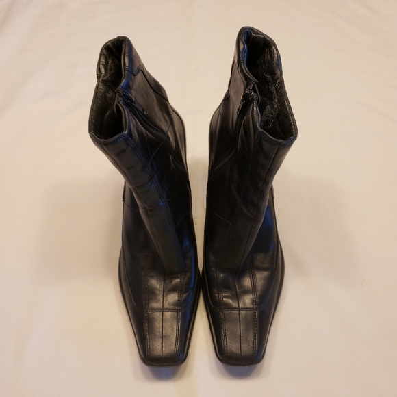 Emily in Paris Inspo: Prada Heeled Black Boots - Picture 3 of 16